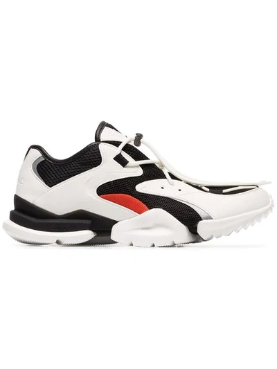 Shop Reebok Black And White Run R96 Low Top Sneakers