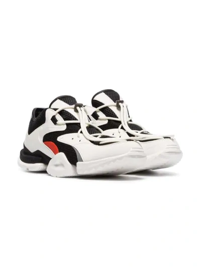 Shop Reebok Black And White Run R96 Low Top Sneakers
