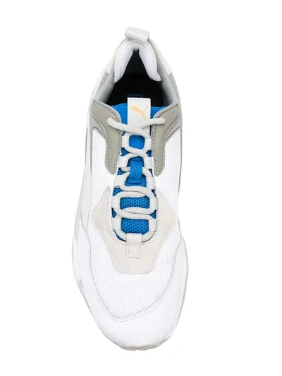 Shop Puma Thunder Sneakers In White