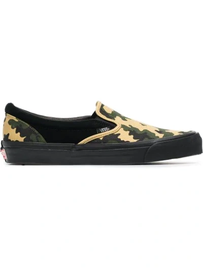 Shop Vans Camo Slip-on Canvas Sneakers - Green