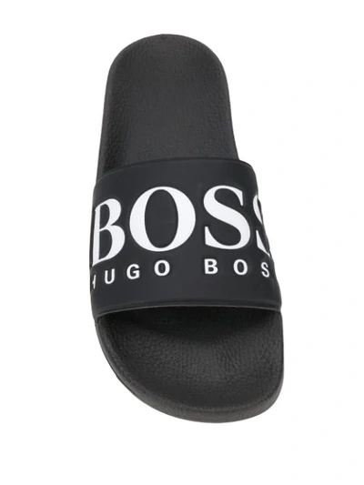 Shop Hugo Boss Logo Embossed Slides In Black