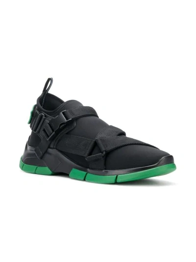 Shop Prada Buckle Sneakers In Black