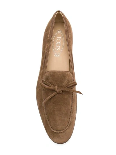 Shop Tod's Bow-trimmed Loafers - Brown