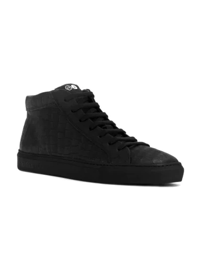 Shop Hide & Jack Mid Top Sneakers In Black