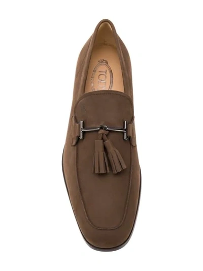 Shop Tod's Tassel Detail Loafers In Brown