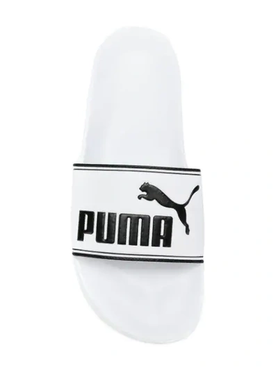 Shop Puma Logo Upper Slides In White