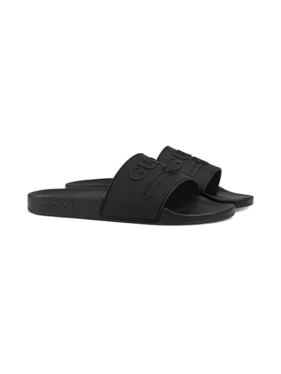 Shop Gucci Logo Rubber Slide Sandal In Black