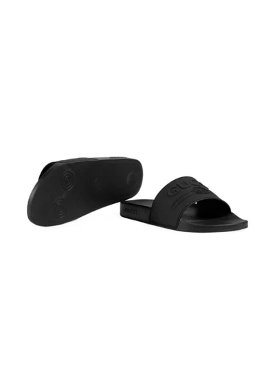 Shop Gucci Logo Rubber Slide Sandal In Black