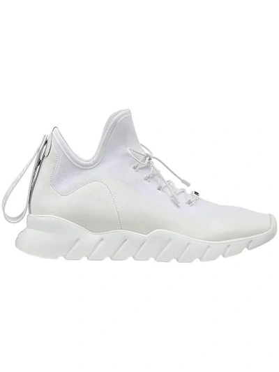 Shop Fendi Tab-appliqué Sneakers In White