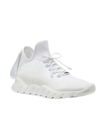 Shop Fendi Tab-appliqué Sneakers In White