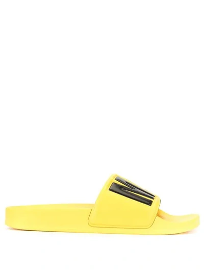 Shop Msgm Logo Embossed Slides In Yellow