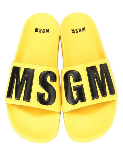 Shop Msgm Logo Embossed Slides In Yellow