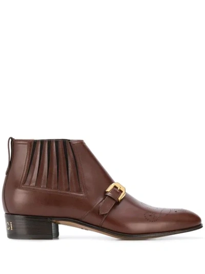 Shop Gucci Buckle Detail Ankle Boots In Brown