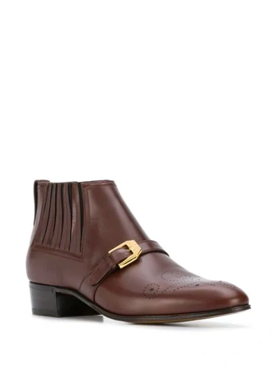 Shop Gucci Buckle Detail Ankle Boots In Brown