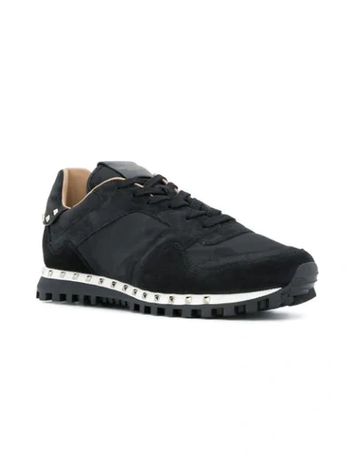 Shop Valentino Rockstud Sneakers In Black