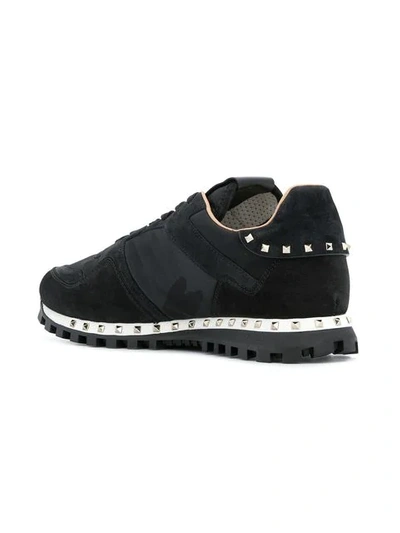 Shop Valentino Rockstud Sneakers In Black