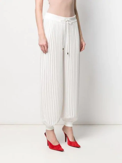 Shop Atu Body Couture Pleated Design Trousers In White