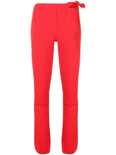Shop Humanoid Track Trousers In Red