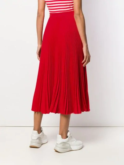 Shop Msgm Pleated Midi Skirt In Red