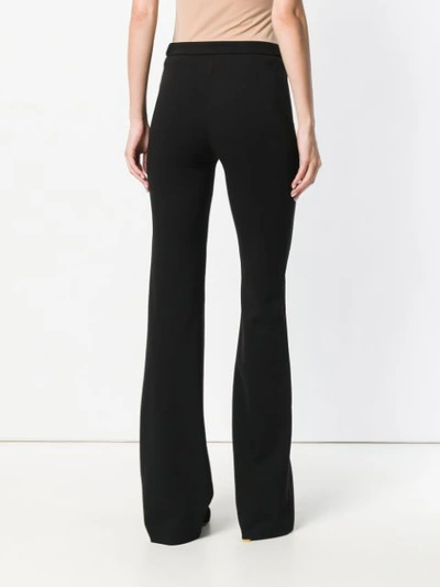 Shop Pinko Creased Flared Trousers In Black