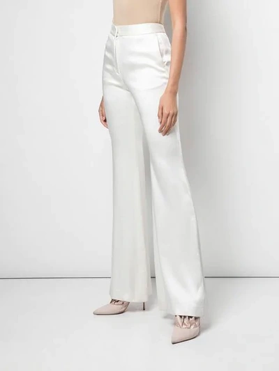 Shop Adam Lippes Flared Trousers In White
