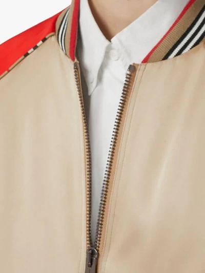 Shop Burberry Icon Stripe Detail Monogram Motif Bomber Jacket In Brown