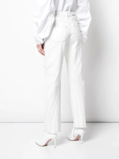 Shop Mugler Stitching Detail Trousers In White