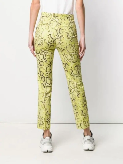 Shop Pinko Snakeskin Print Trousers In Yellow