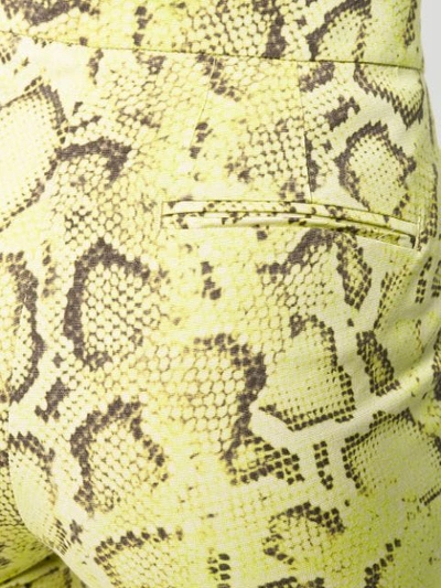 Shop Pinko Snakeskin Print Trousers In Yellow