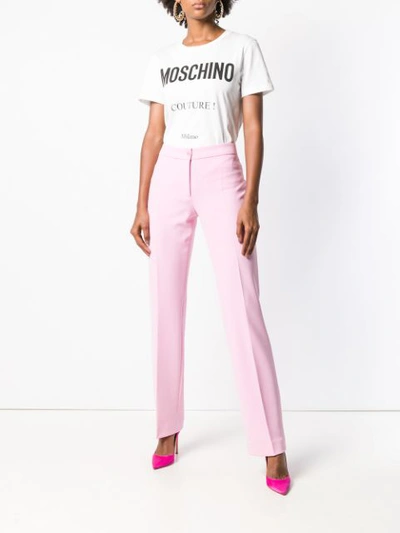 Shop Moschino Slim In Pink