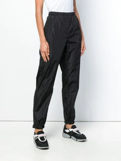 Shop Prada Logo Side Stripe Track Pants - Black