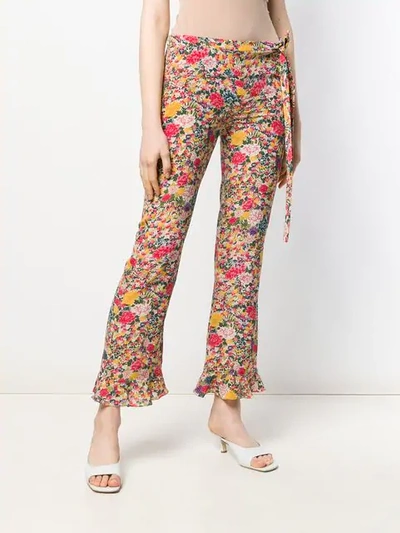 Shop Etro Flower Print Flare Trousers In Yellow