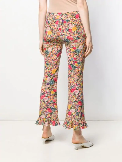 Shop Etro Flower Print Flare Trousers In Yellow