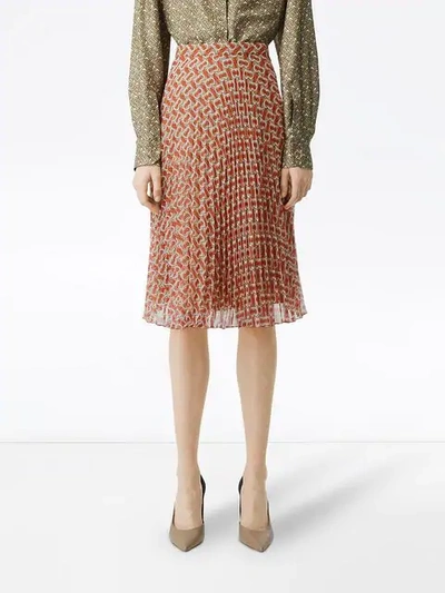 Shop Burberry Monogram Print Pleated Skirt In Red