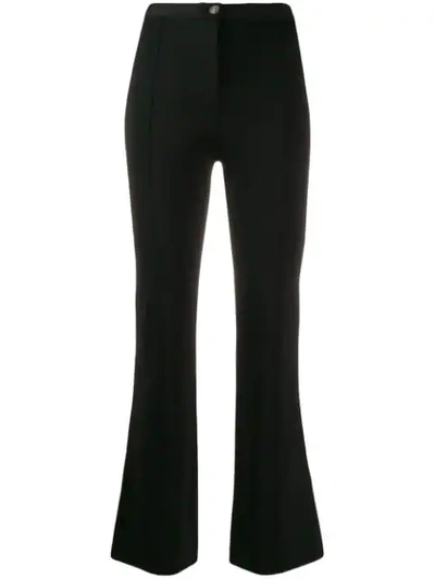 Shop Givenchy Slim Flared Trousers In Black