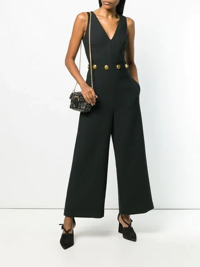 Shop Tory Burch Buttoned Jumpsuit - Black