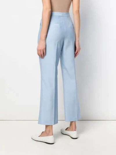 Shop Partow Cropped Flared Trousers In Blue