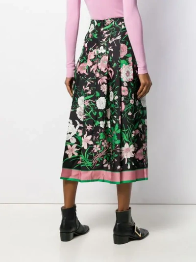 Shop Gucci Flora Print Skirt In Black