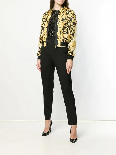 Shop Versace Fitted Bomber Jacket In A7900 Black Yellow