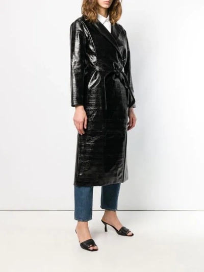 Shop Totême Belted Trench Coat In Black