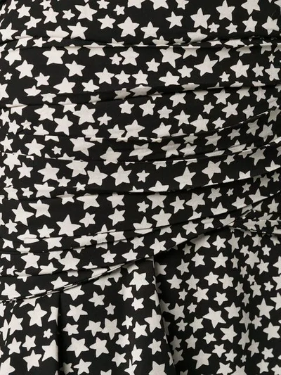 Shop Saint Laurent Star Print Mini Skirt In Black