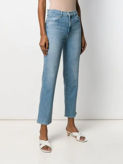Shop J Brand Faded Cropped Jeans In Blue