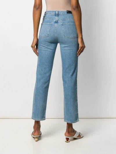 Shop J Brand Faded Cropped Jeans In Blue