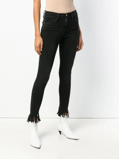 Shop Frame Le High Skinny Fringe Trousers In Black