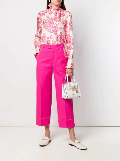 Shop The Gigi Ruffled Neck Floral Print Blouse In Pink