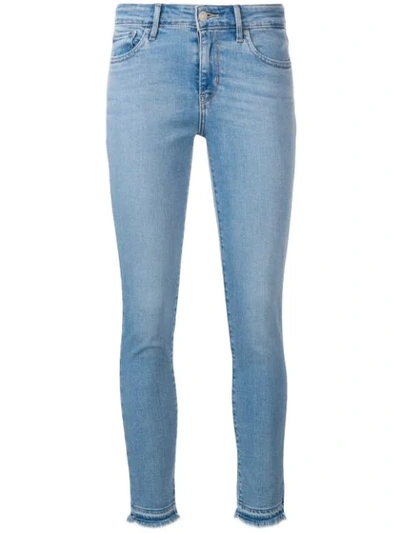 Shop Levi's Frayed Hem Skinny Jeans In Blue