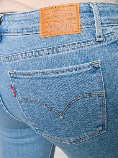 Shop Levi's Frayed Hem Skinny Jeans In Blue
