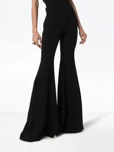 Shop Balmain High-waisted Flared Silk-crepe Trousers In Black