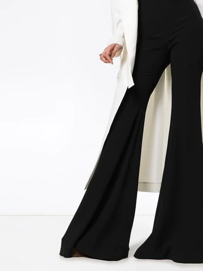 Shop Balmain High-waisted Flared Silk-crepe Trousers In Black