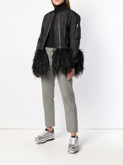 Shop Moschino Feather Trim Bomber Jacket In Black